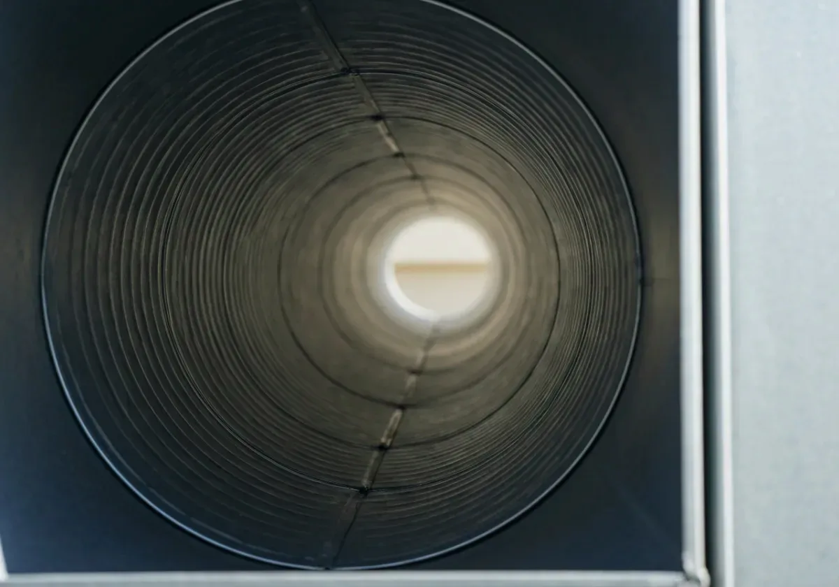 After — air duct cleaning: Dust-caked supply ducts cleared so the system moves clean air again.
