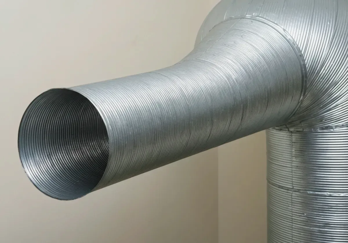 After — dryer vent cleaning: A lint-packed vent run opened up for a cooler, faster, safer dryer.